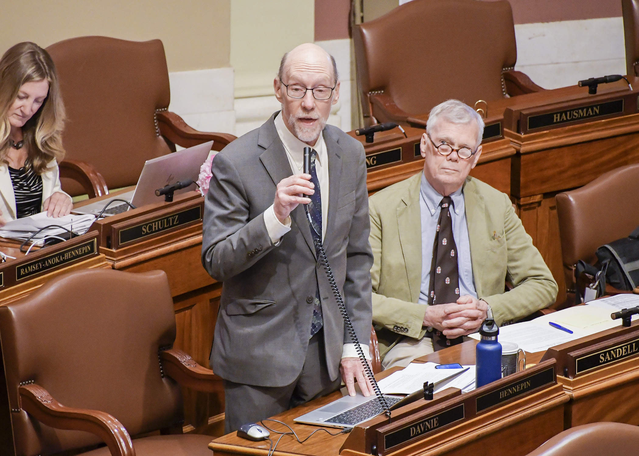 Rep. Jim Davnie, chair of the House Education Finance Committee, presents the omnibus education finance bill during Saturday’s special session. Photo by Andrew VonBank